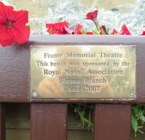 Inscription on bench dedicated by the Royal Naval Association outside the Frome Memorial Theatrre