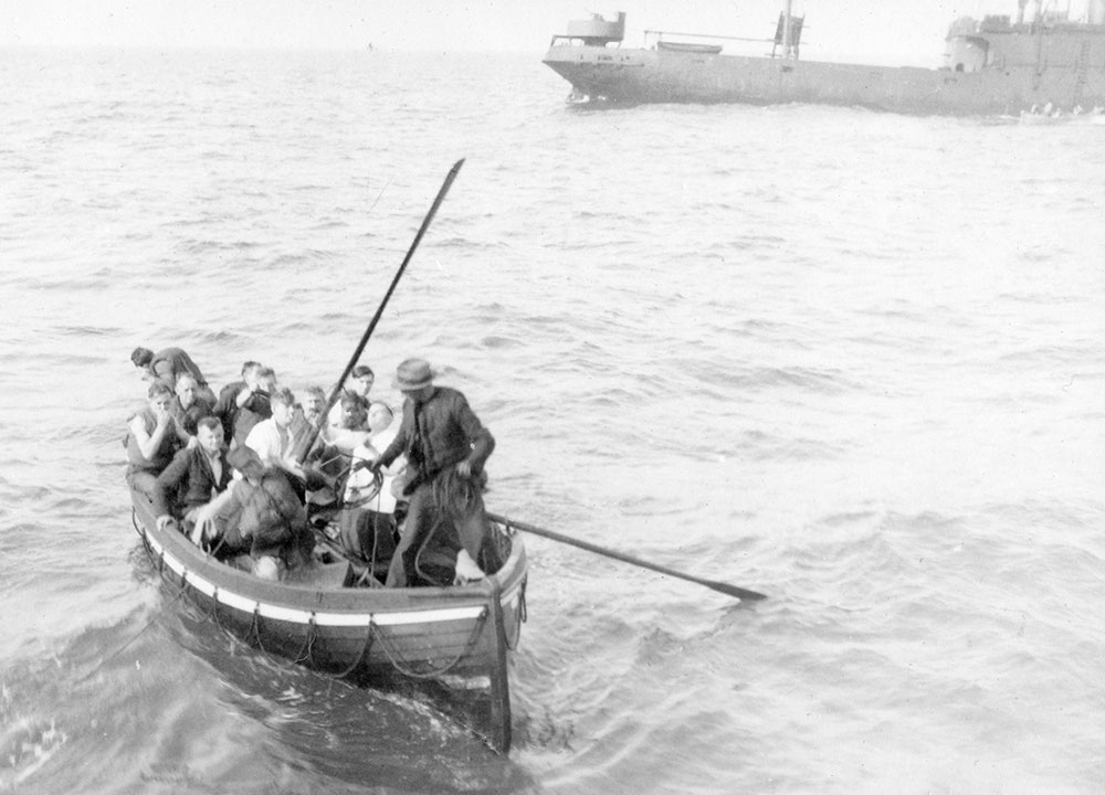 The whaler from HMS Vivien rescuing survivors from the SS Brixton