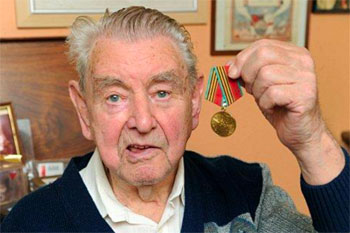 Arthur Gardner with the Ushakov Medal awarded by the Russian Government to Arctic Convoy veterans