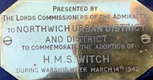 The inscribed plate on the Admiralty shield for HMS Witch
